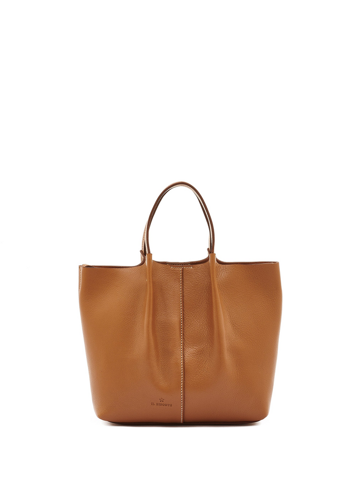 A tan pebbled leather tote bag with double top handles and a vertical center seam, shown against a plain white background.