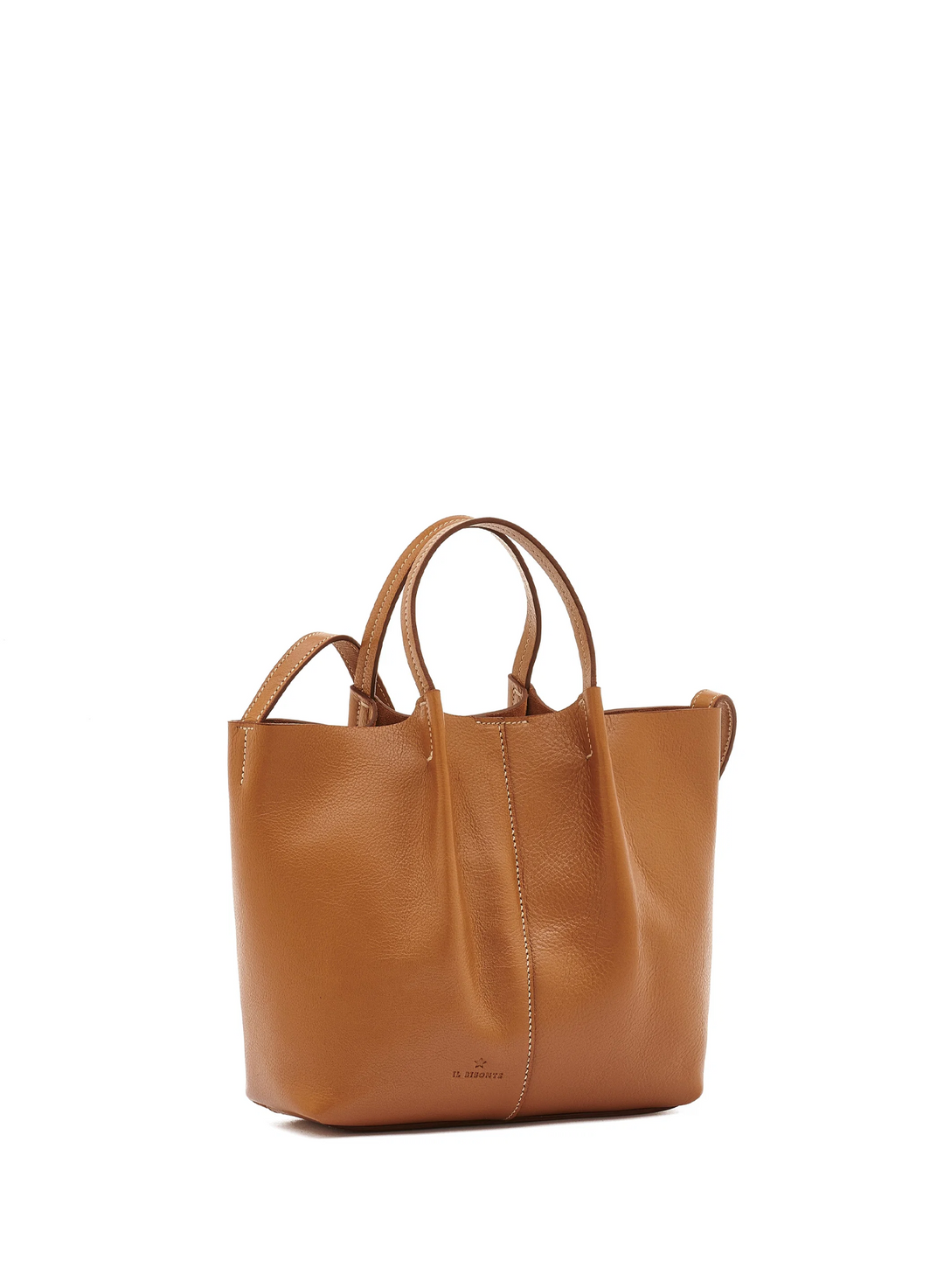 A tan leather tote bag with double top handles, shown from a three-quarter angle on a solid white background.